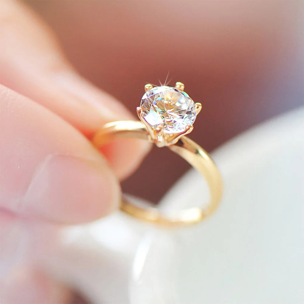 Eterna Moissanite Round Cut Solitaire Gold Ring